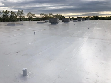 Completed commercial flat roof project by Bel Air Foam & Roofing in Maryland