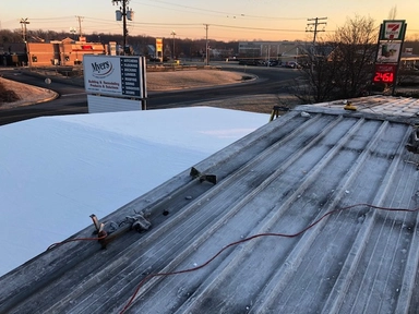 Completed commercial flat roof project by Bel Air Foam & Roofing in Maryland